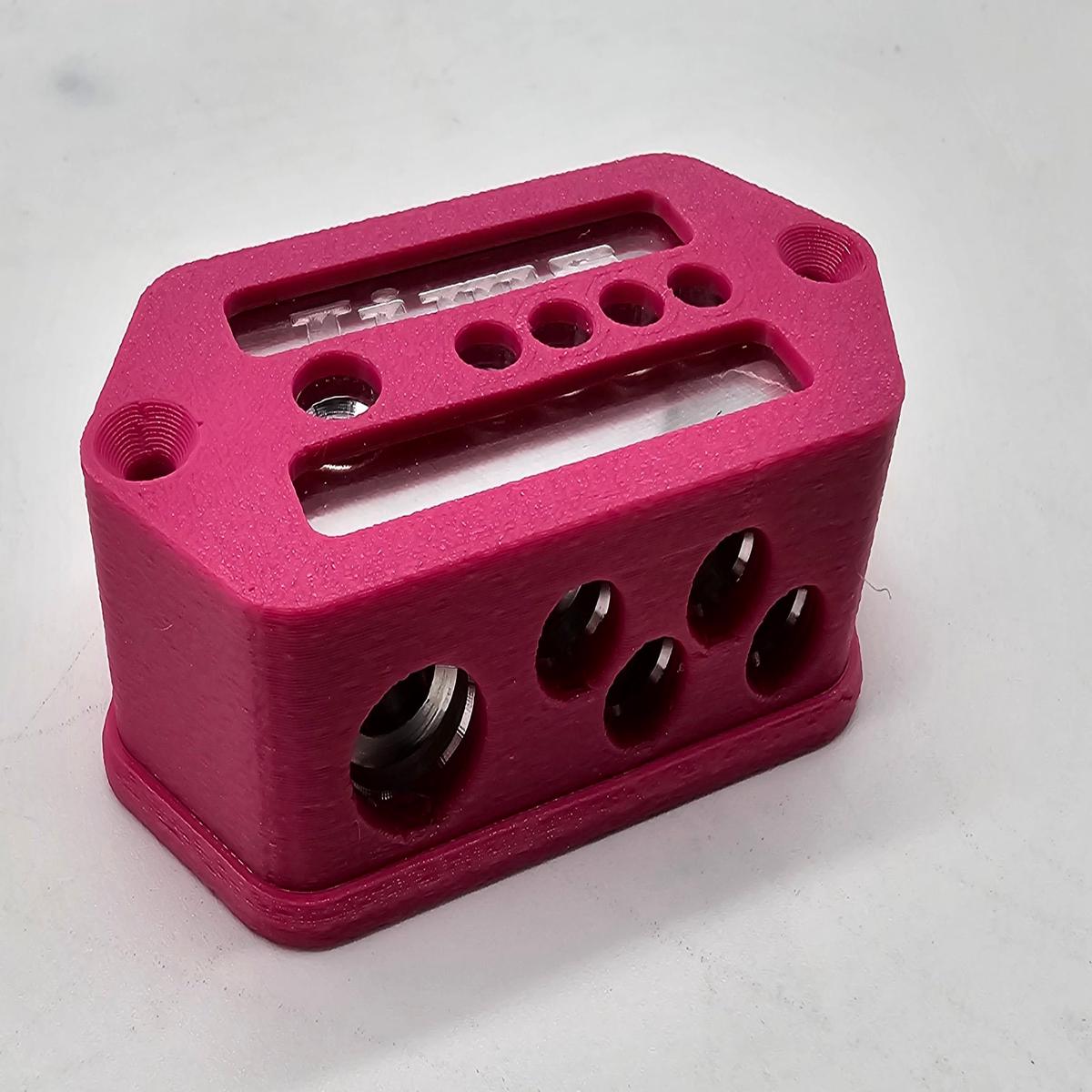 Cased 4 gauge to 4-8 gauge distribution blocks - magenta